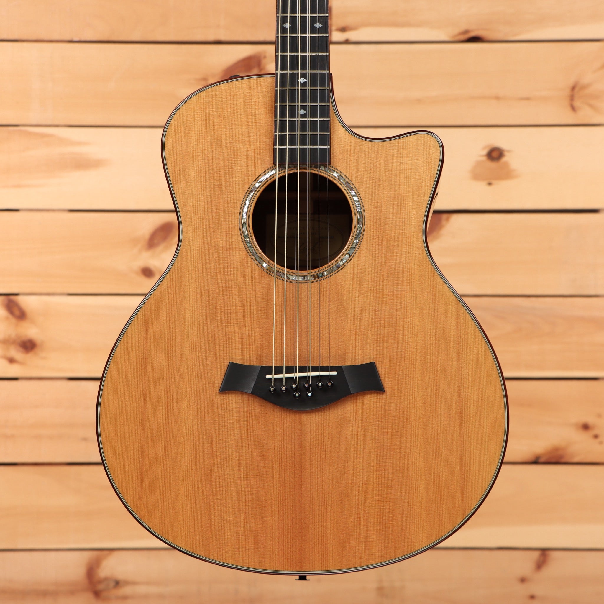 Taylor Baritone 8-String acoustic guitar natural finish with cutaway body and rosewood fretboard