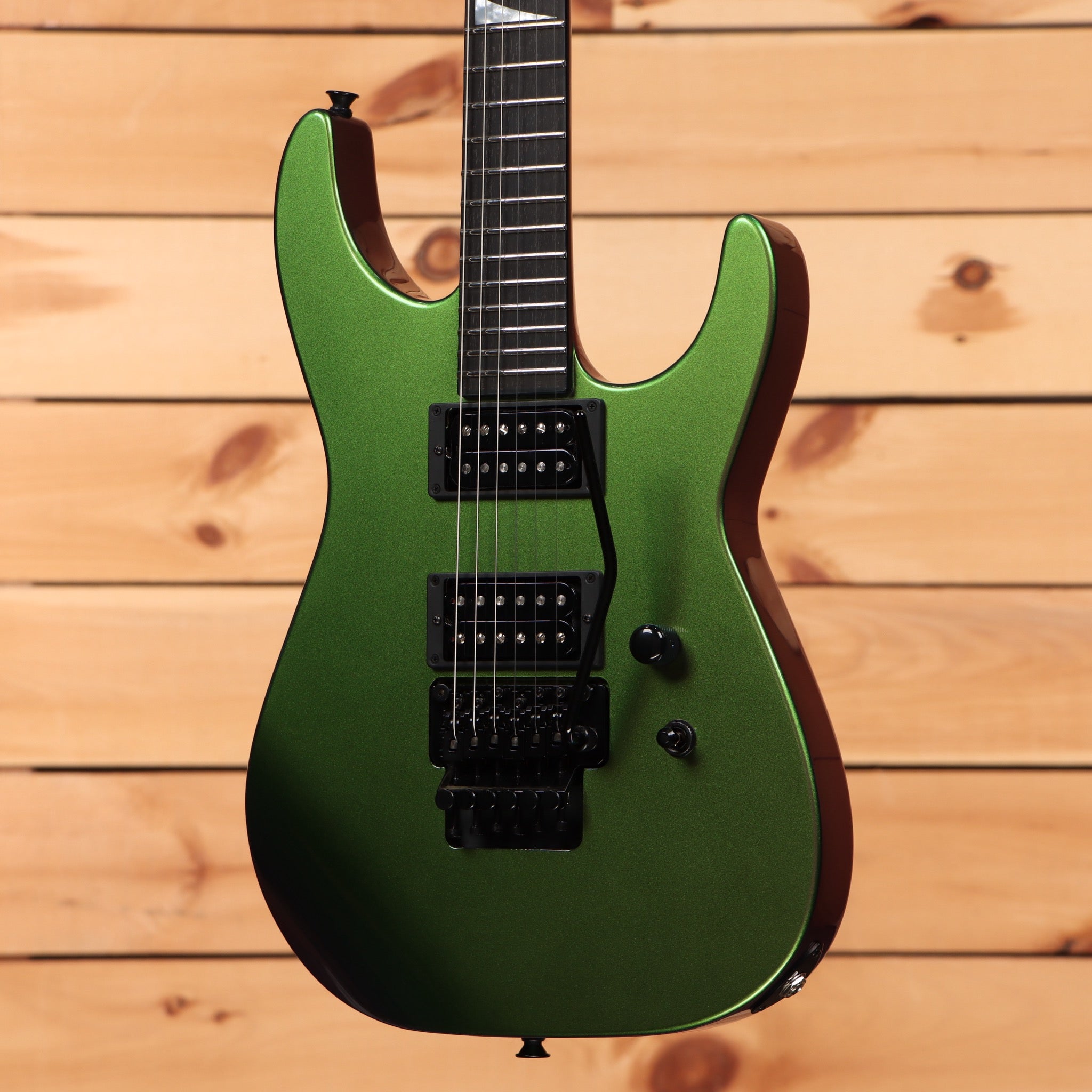 Jackson Righteous Run Custom Soloist electric guitar Purple to Green Shift finish with dual humbuckers and black Floyd Rose t