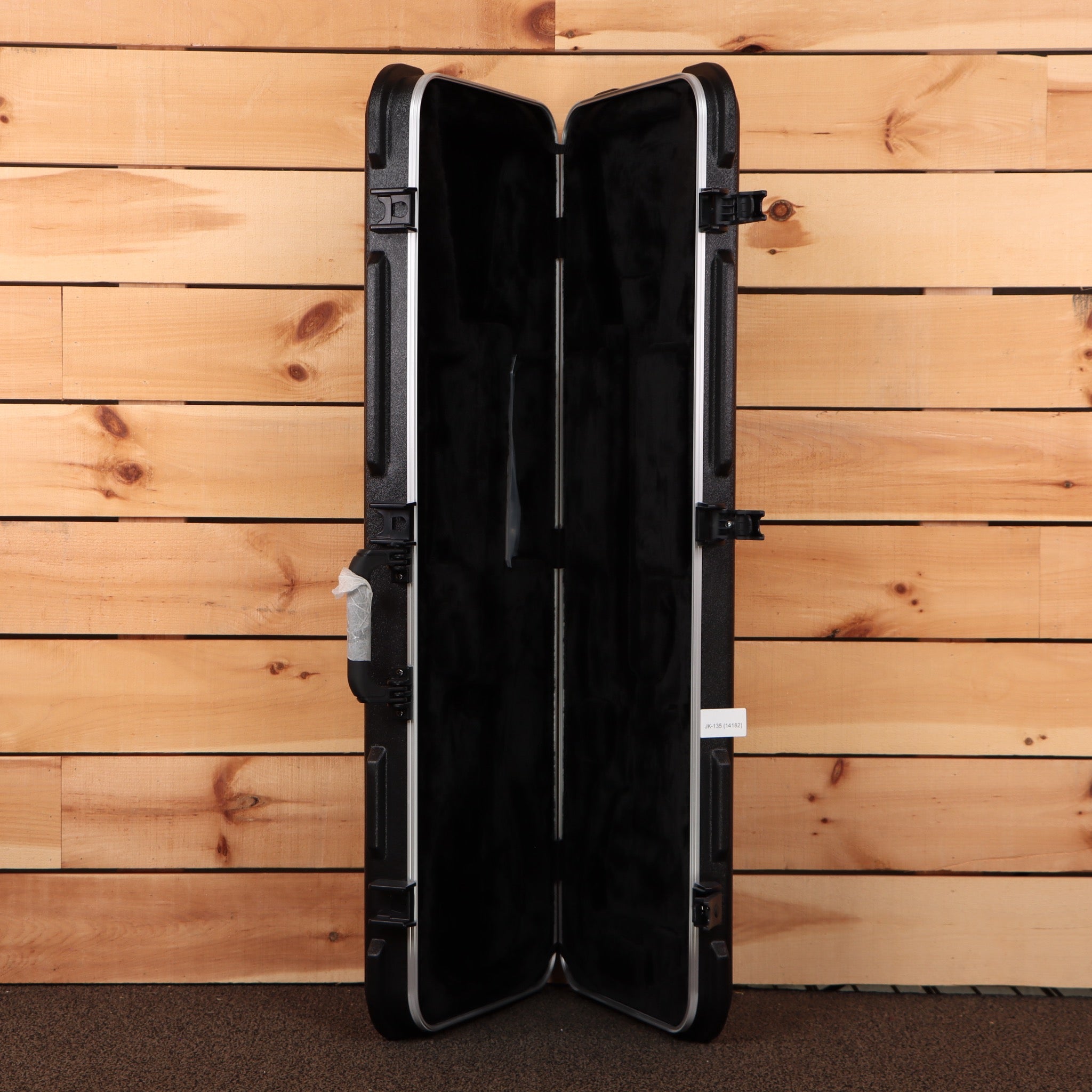 Jackson Righteous Run Custom Soloist guitar hard case black ABS plastic with silver hardware latches open interior view