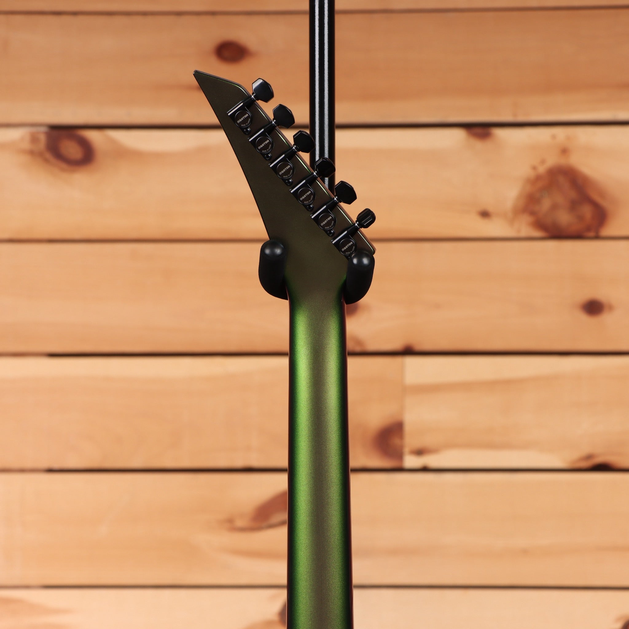 Jackson Righteous Run Custom Soloist electric guitar Purple to Green Shift with black hardware and pointed headstock