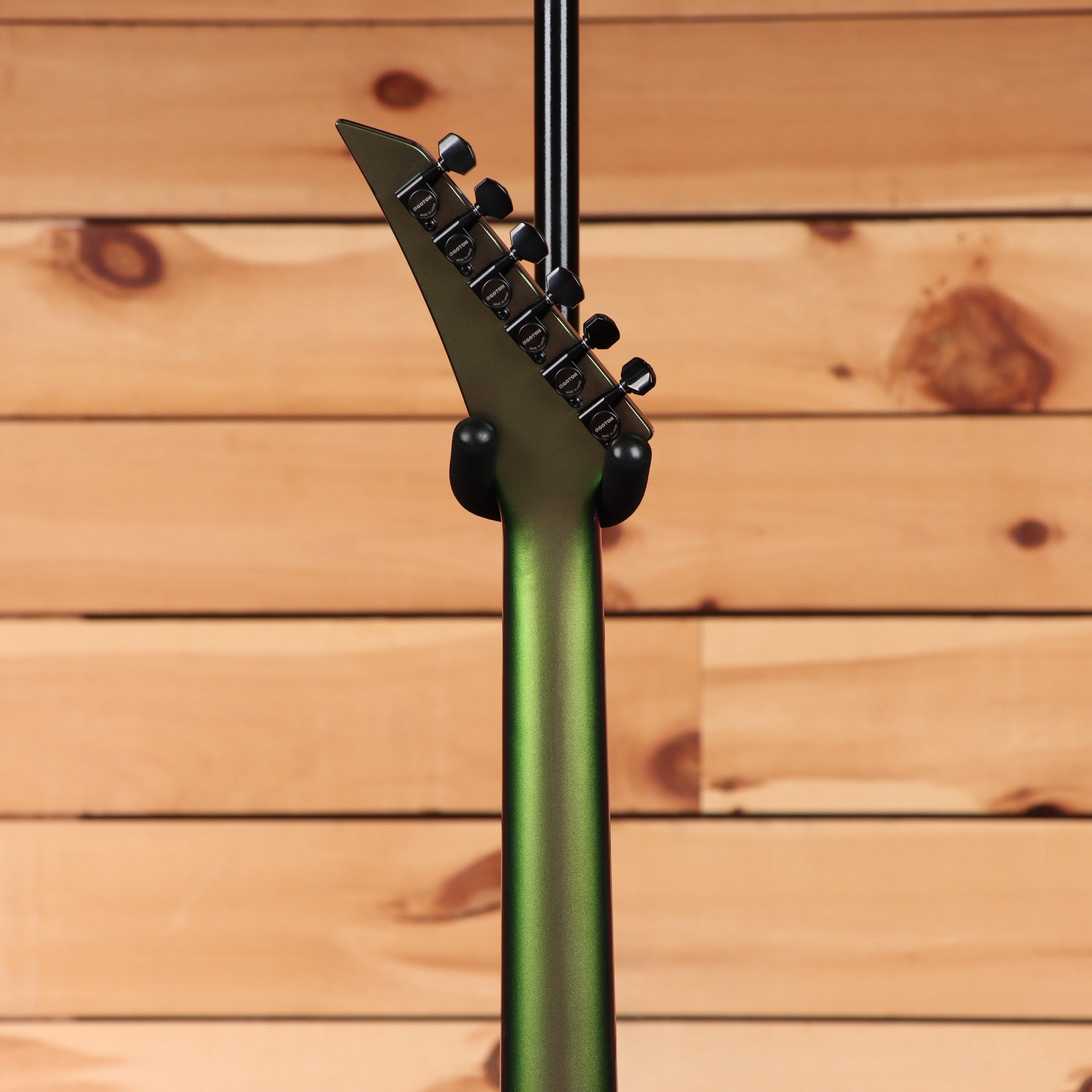 Jackson Righteous Run Custom Soloist electric guitar Purple to Green Shift with black hardware and pointed headstock