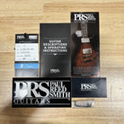 PRS Paul Reed Smith S2 Vela Semi-Hollow McCarty Burst accessories pack with manual, hang tag, sticker, and hardware