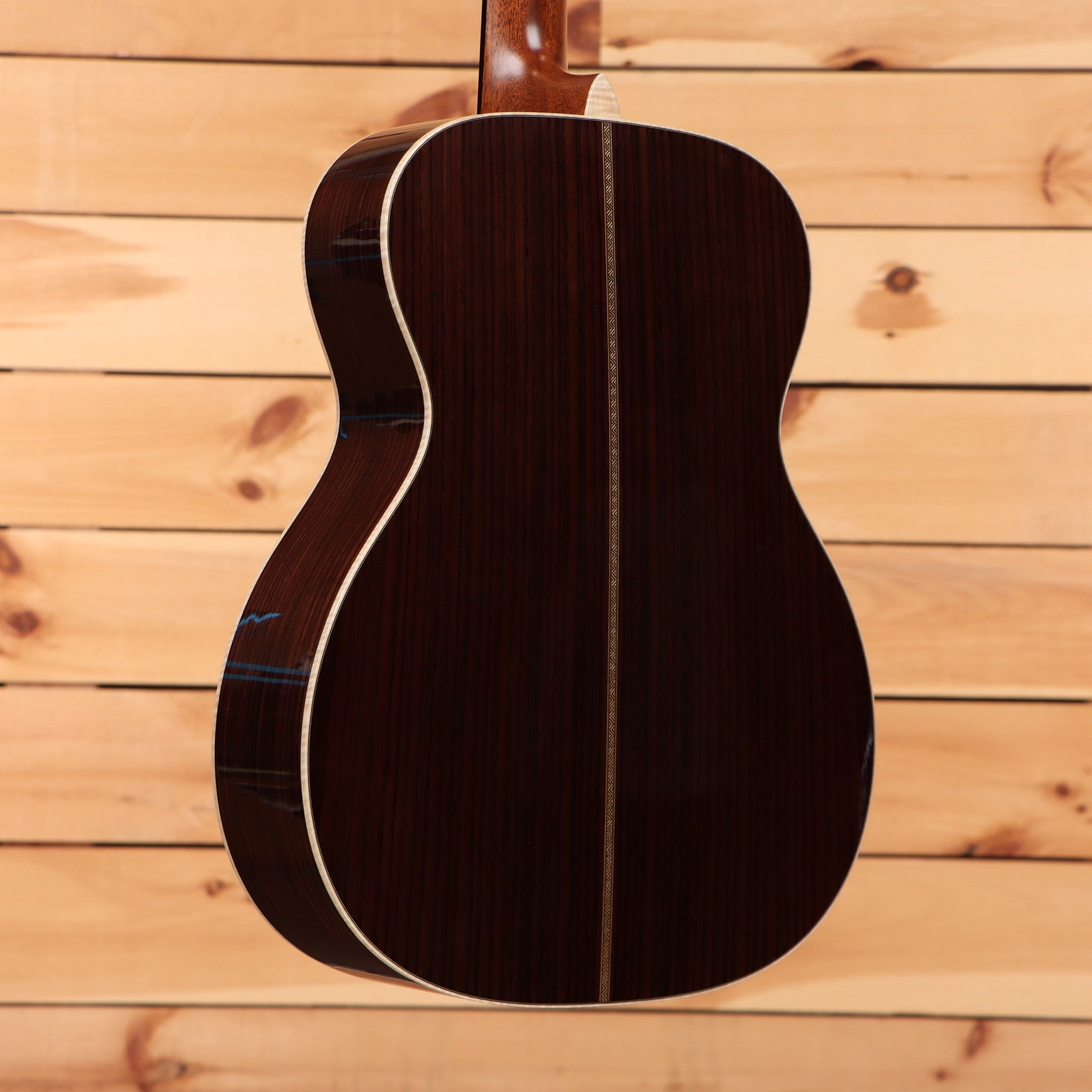 Martin OM28 Modern Deluxe acoustic guitar natural finish with white binding and rosewood back