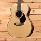 Martin OM28 Modern Deluxe acoustic guitar natural finish with abalone binding and ebony fretboard
