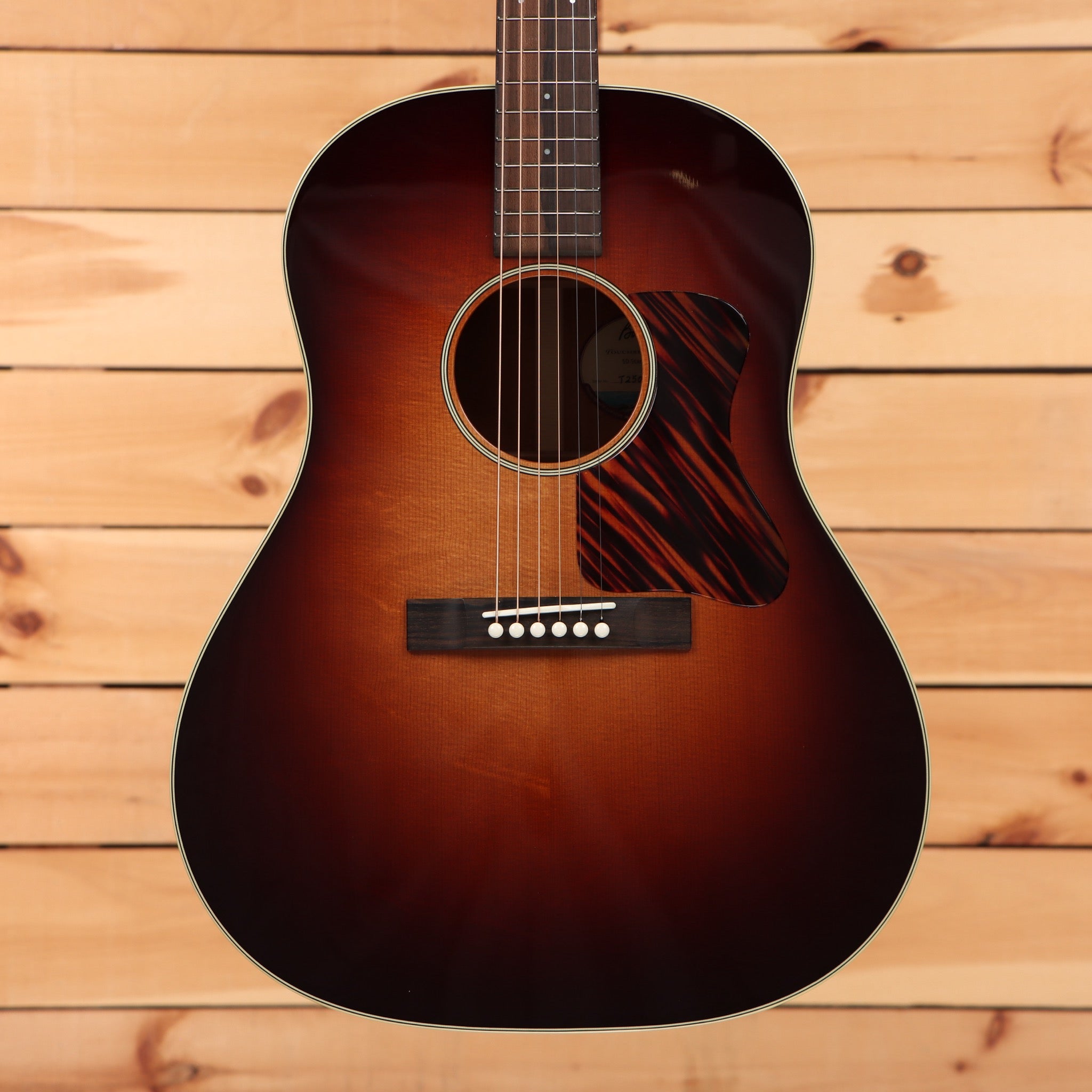 Bourgeois SDST dreadnought acoustic guitar sunburst finish with red pickguard and rosewood fretboard