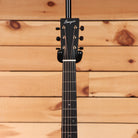 Bourgeois Touchstone Soloist OMC natural acoustic guitar with 12-string configuration and ebony headstock