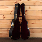 Martin OM28 Modern Deluxe acoustic guitar natural finish with gold hardware and burgundy velvet case interior