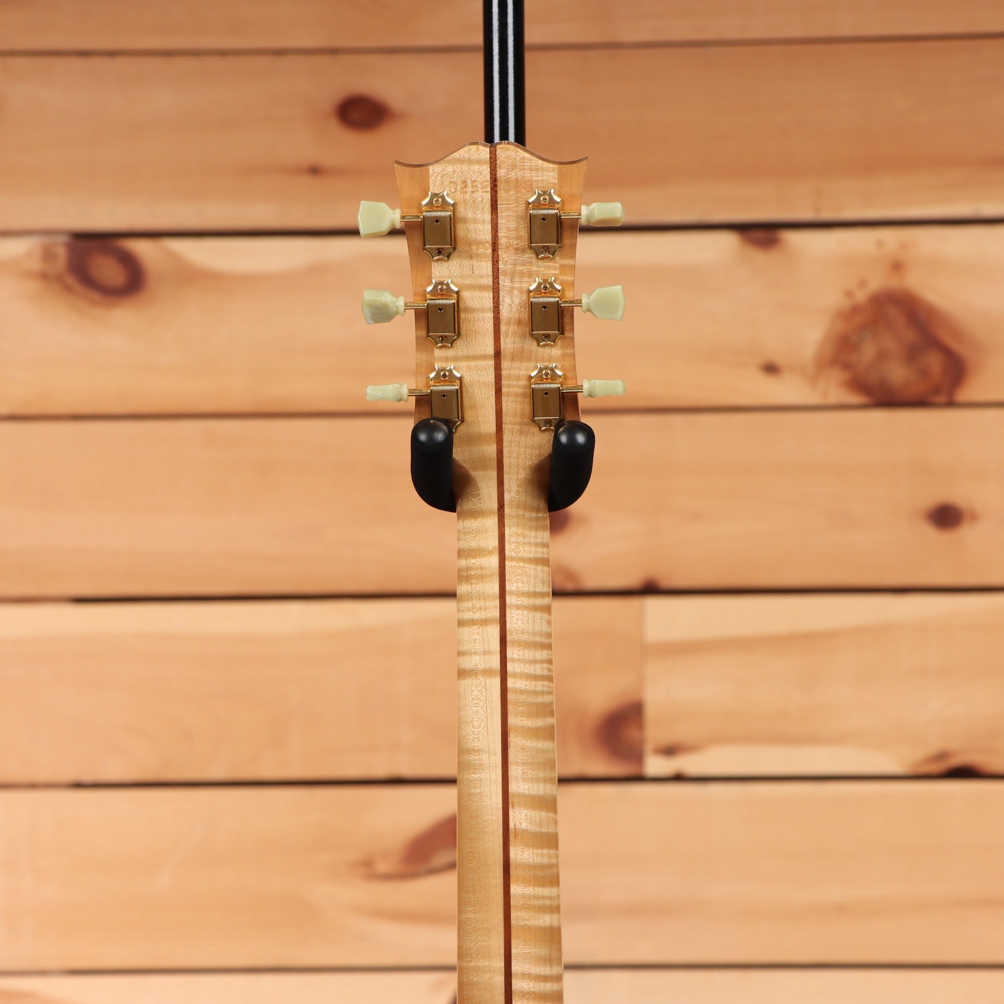 Gibson SJ-200 True Vintage Natural jumbo acoustic guitar back of flamed maple neck with gold tuners