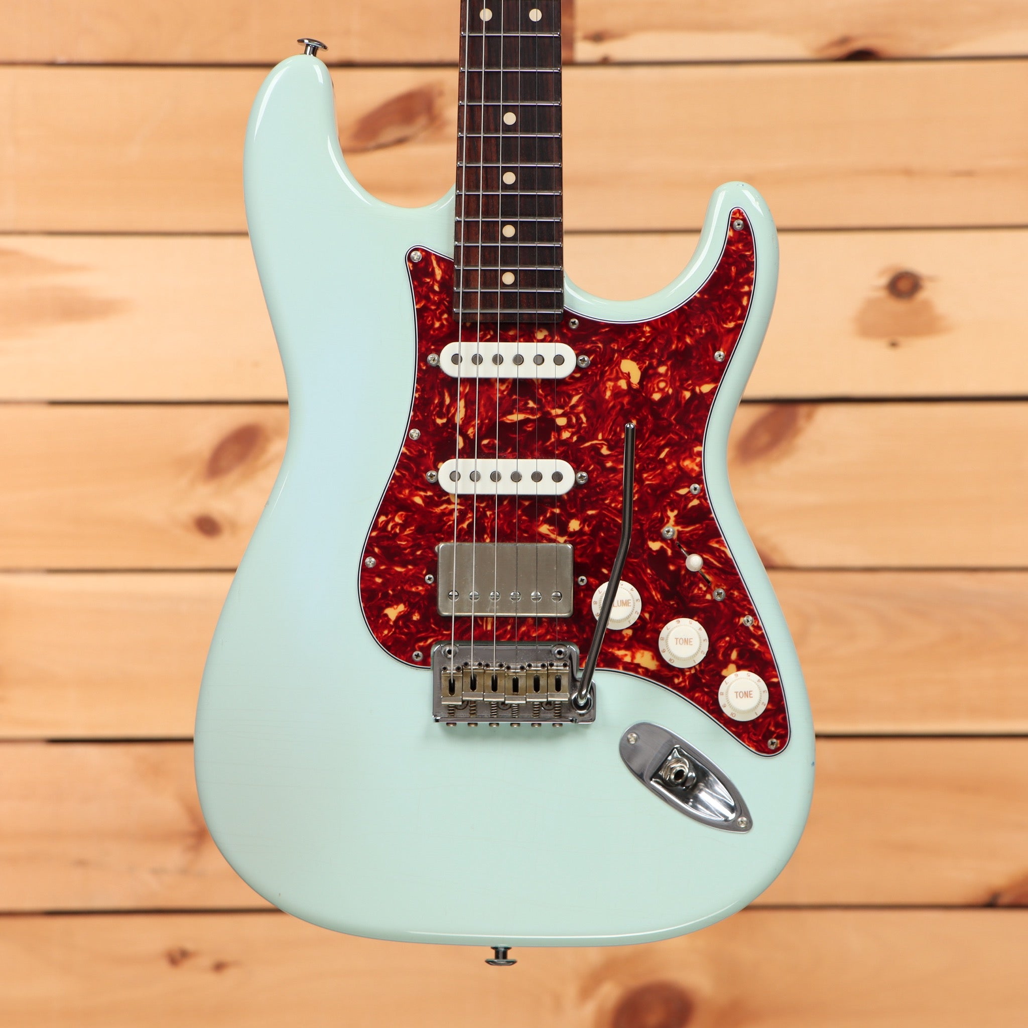 Suhr Classic S Antique Sonic Blue pre-owned electric guitar Stratocaster with red tortoiseshell pickguard and single-coil pickups