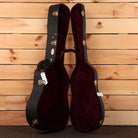 Martin 2026 NAMM Custom dreadnought acoustic guitar case with burgundy velvet interior and gold hardware
