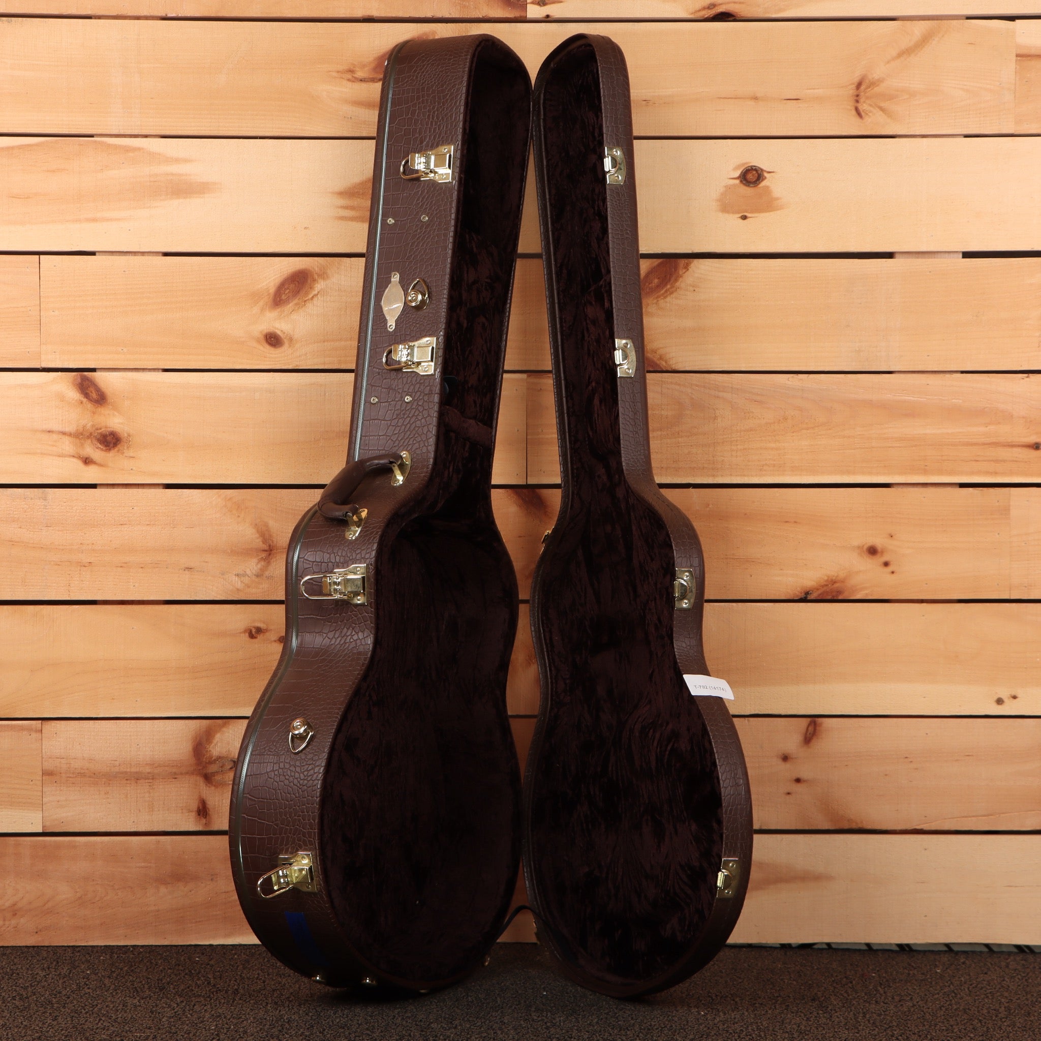 Taylor Baritone 8-String acoustic guitar natural finish with gold hardware and black velvet interior case