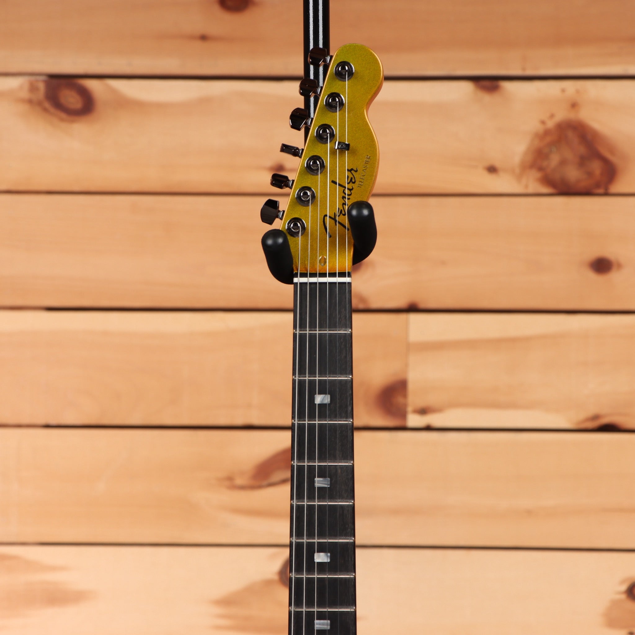 Fender 75th Anniversary American Ultra II Telecaster electric guitar Liquid Gold with black headstock tuners