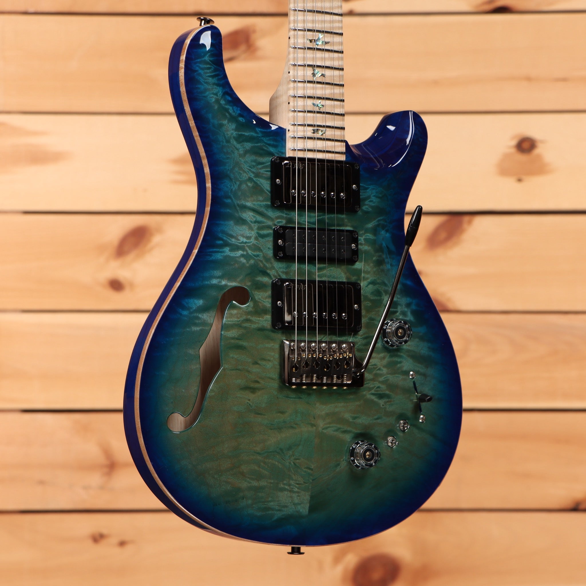 Paul Reed Smith Special semi-hollow electric guitar Makena Blue pre-owned with f-hole and figured maple top