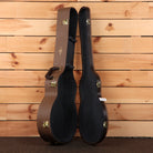 Taylor 814e Gold Label hardshell guitar case brown exterior black interior with gold latches open view