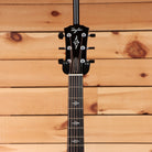 Taylor 814e Gold Label acoustic-electric guitar Natural with ebony fretboard and floral inlays on black headstock