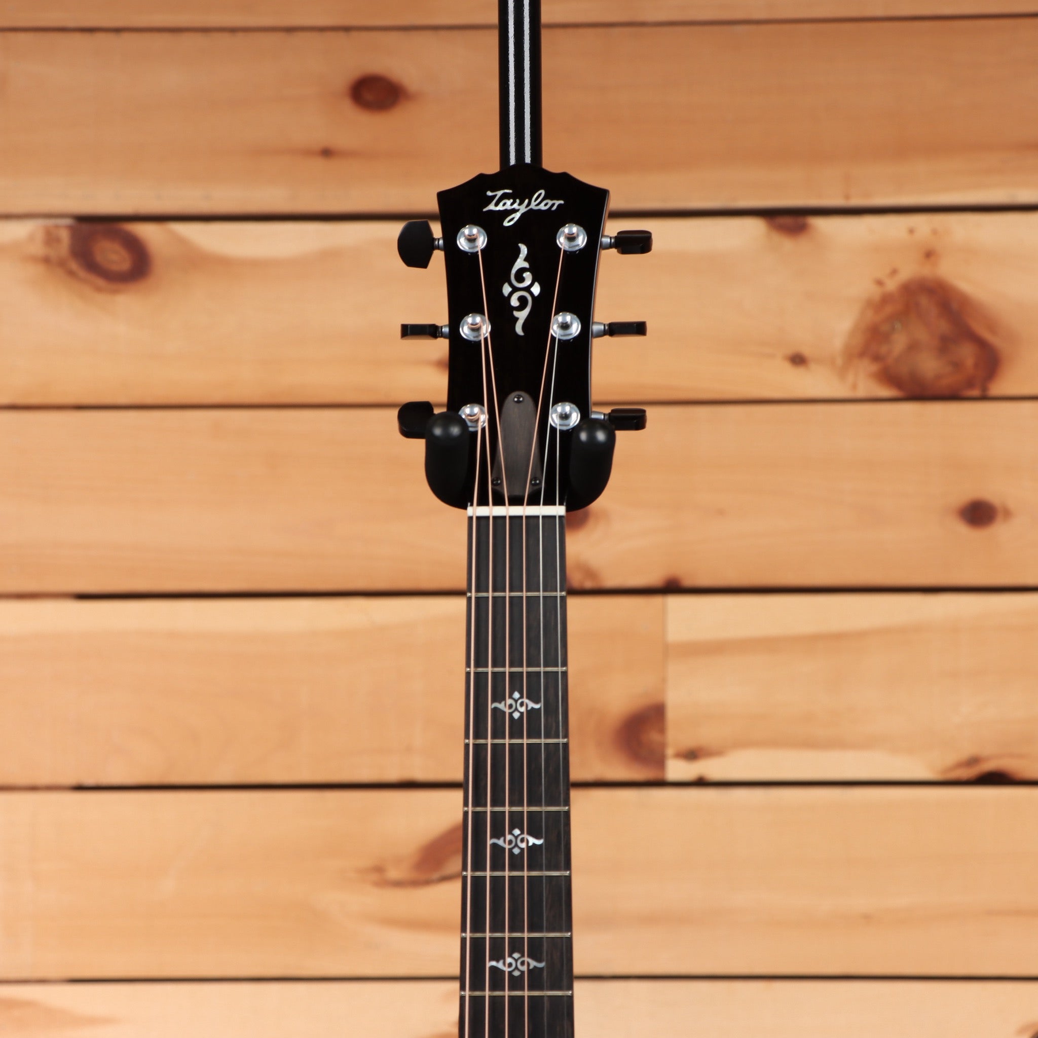 Taylor 814e Gold Label acoustic-electric guitar Natural with ebony fretboard and floral inlays on black headstock