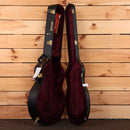 Gretsch Pro Falcon hollowbody guitar hard case black with burgundy velvet interior and gold hardware latches