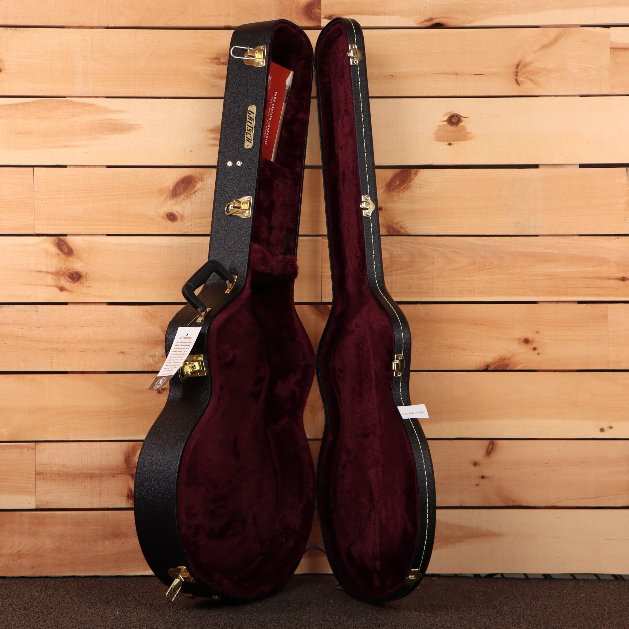 Gretsch Pro Falcon hollowbody guitar hard case black with burgundy velvet interior and gold hardware latches
