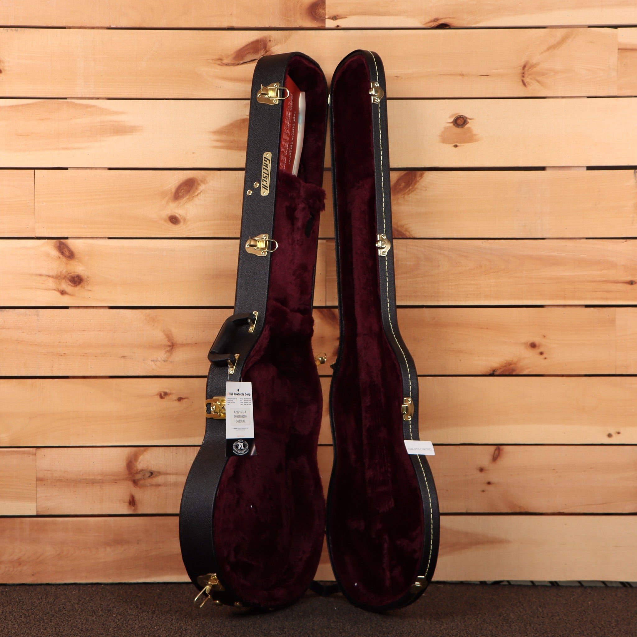 Gretsch G6134T-58 Vintage Select Penguin hardshell guitar case black exterior burgundy velvet interior gold hardware