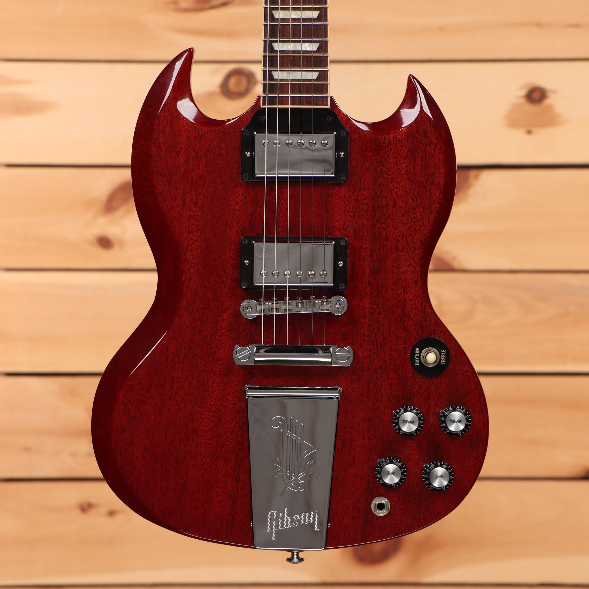 Gibson Derek Trucks SG electric guitar Vintage Red with dual humbuckers and Maestro vibrola tailpiece