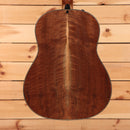 Taylor Custom Grand Pacific acoustic guitar Natural with figured walnut back and black binding