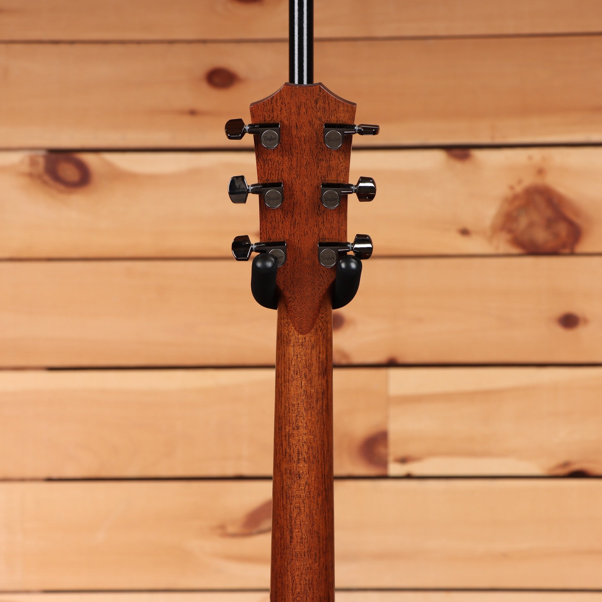Taylor Custom Grand Pacific acoustic guitar Natural mahogany neck rear headstock view with black chrome tuners