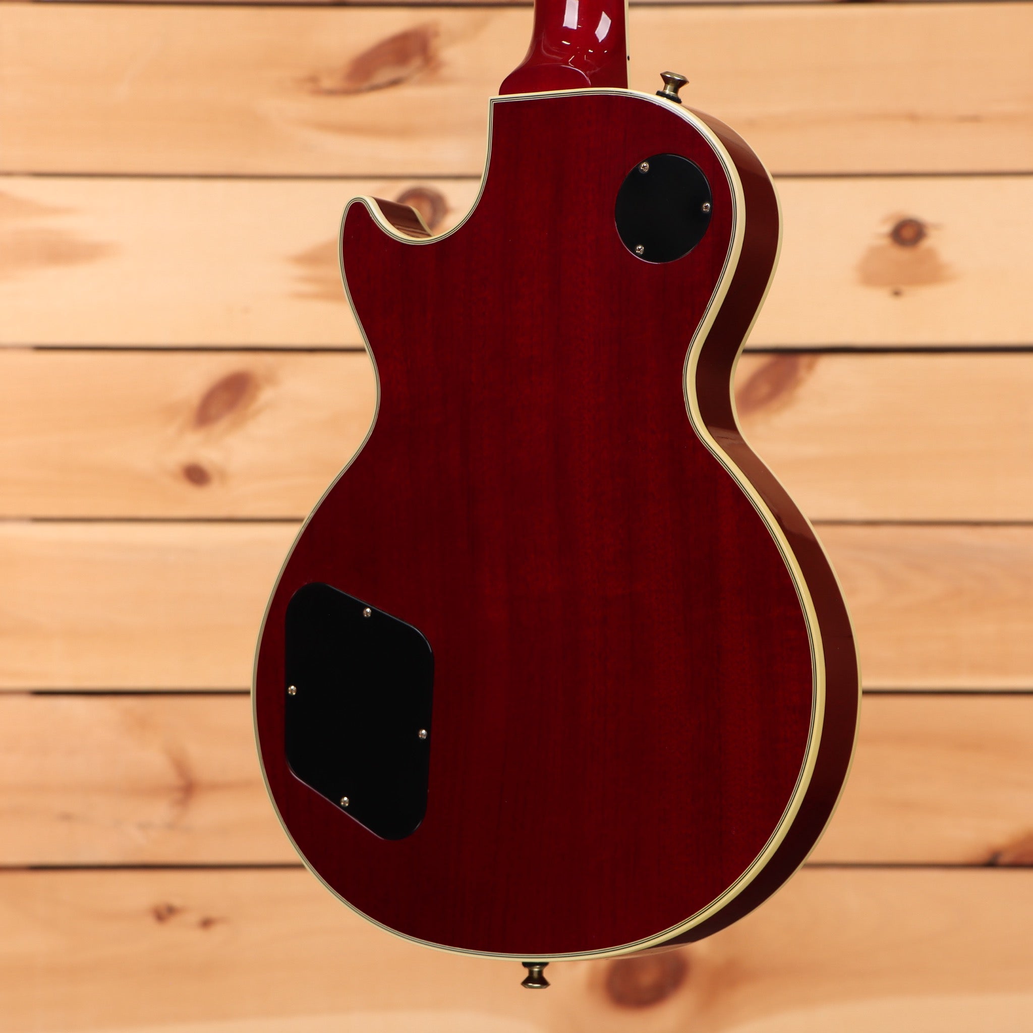 Gibson 68 Les Paul Custom Figured electric guitar Tri-Burst back view with cream binding and mahogany body