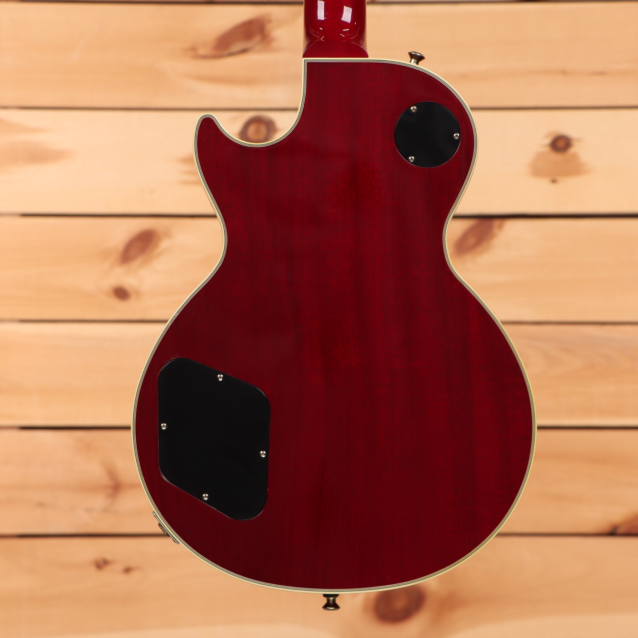 Gibson 68 Les Paul Custom Figured electric guitar Tri-Burst back view with cream body binding and control cavity cover