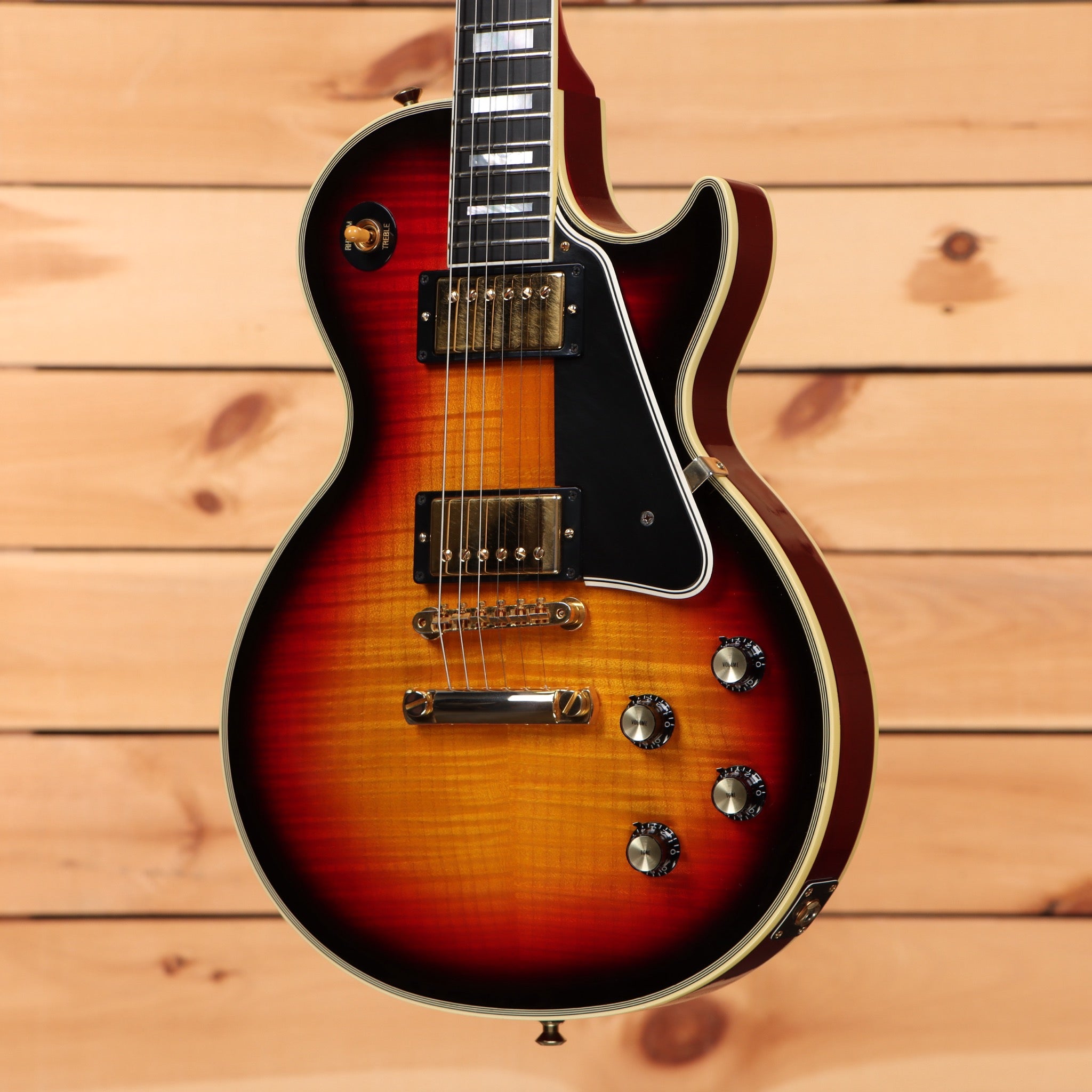 Gibson 68 Les Paul Custom Figured electric guitar Tri-Burst with flamed maple top, dual humbuckers, and gold hardware