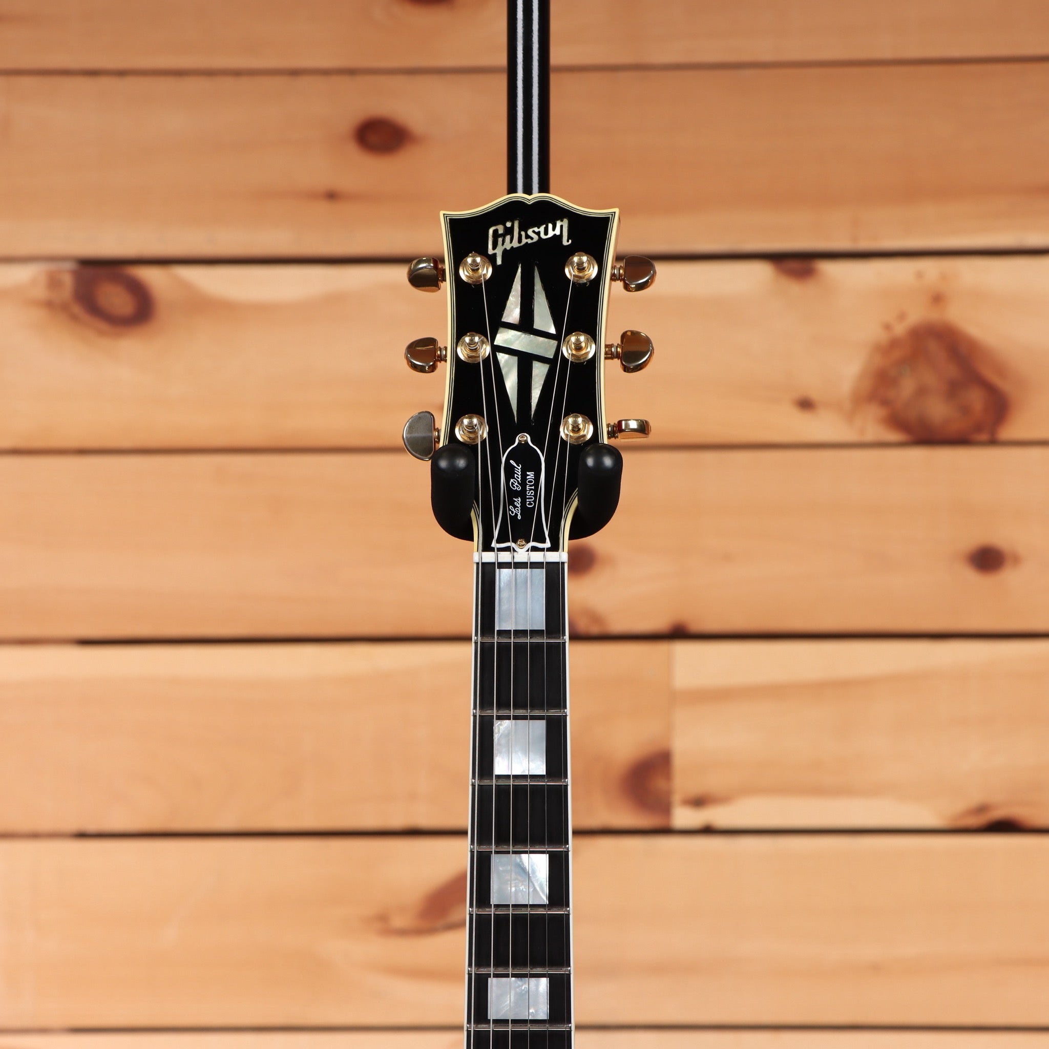 Gibson 68 Les Paul Custom Figured Tri-Burst electric guitar headstock with gold tuners and block inlays