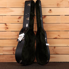 Martin Super HD-28 Aging Toner acoustic guitar hardshell case open showing black exterior and dark green plush interior linin