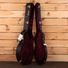 Gretsch G6136T-59 Vintage Select '59 Falcon hardshell guitar case open showing burgundy velvet interior with gold hardware