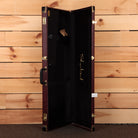 Shabat guitar hardshell case burgundy exterior with black interior gold hardware and Shabat signature logo