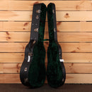 Bourgeois Touchstone SDS/TS acoustic guitar hardshell case open showing black exterior and green velvet interior
