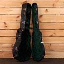 Bourgeois Downeast GAC Koa acoustic guitar hardshell case open showing green velvet interior with chrome latches