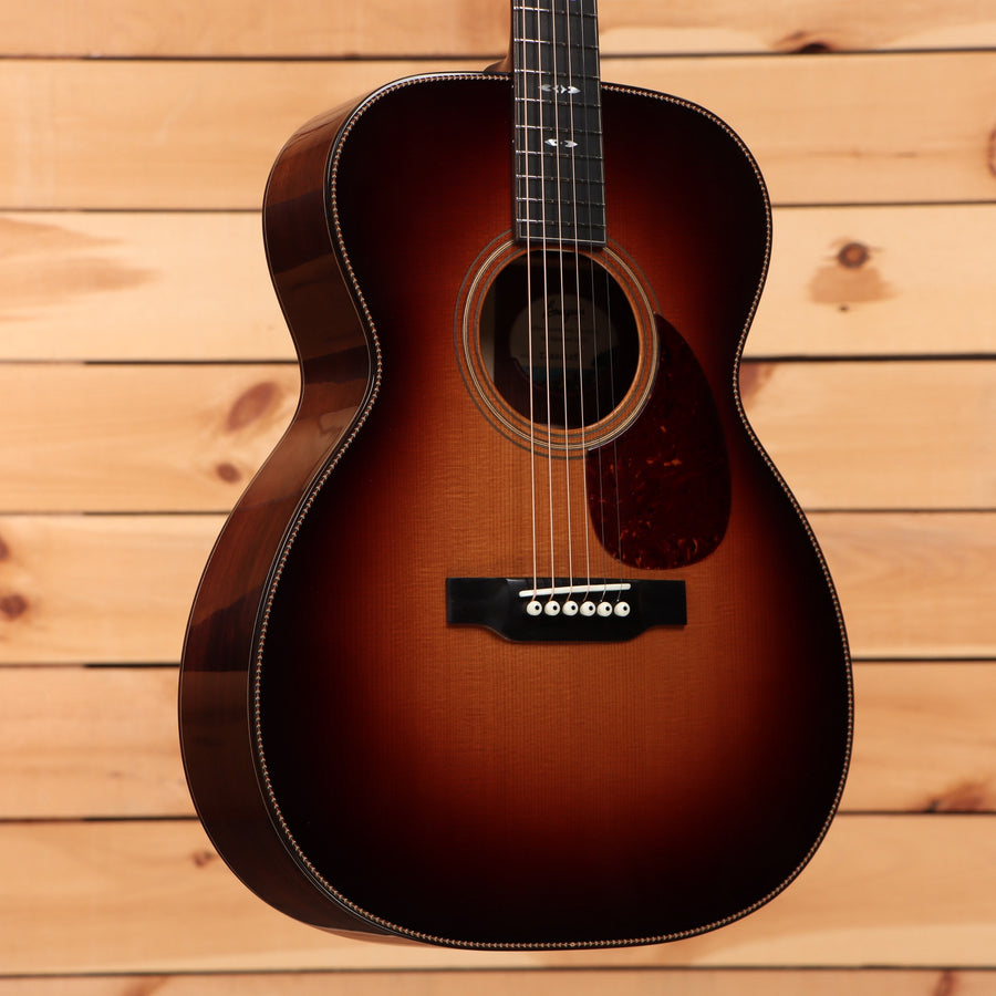 Bourgeois Touchstone Signature OM acoustic guitar Sunburst finish with tortoise pickguard and herringbone body binding