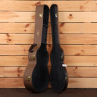 Taylor Gold Label 512e hardshell guitar case brown exterior black interior with gold hardware latches open