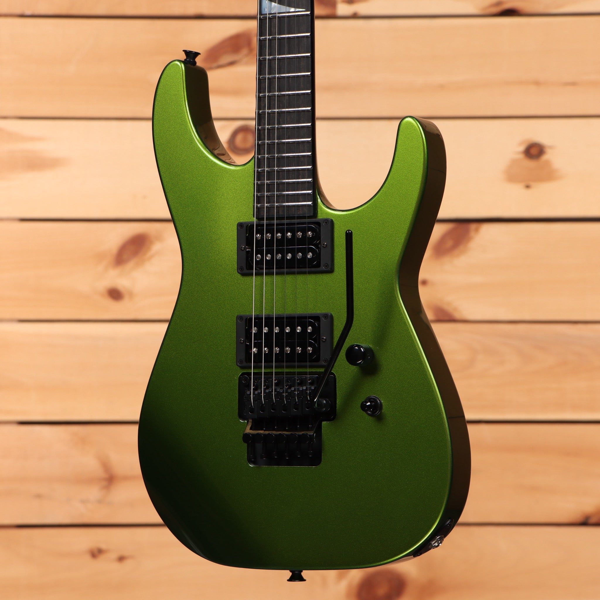 Jackson Righteous Run Custom Soloist electric guitar Green to Gold Shift finish with dual humbuckers and black floyd rose