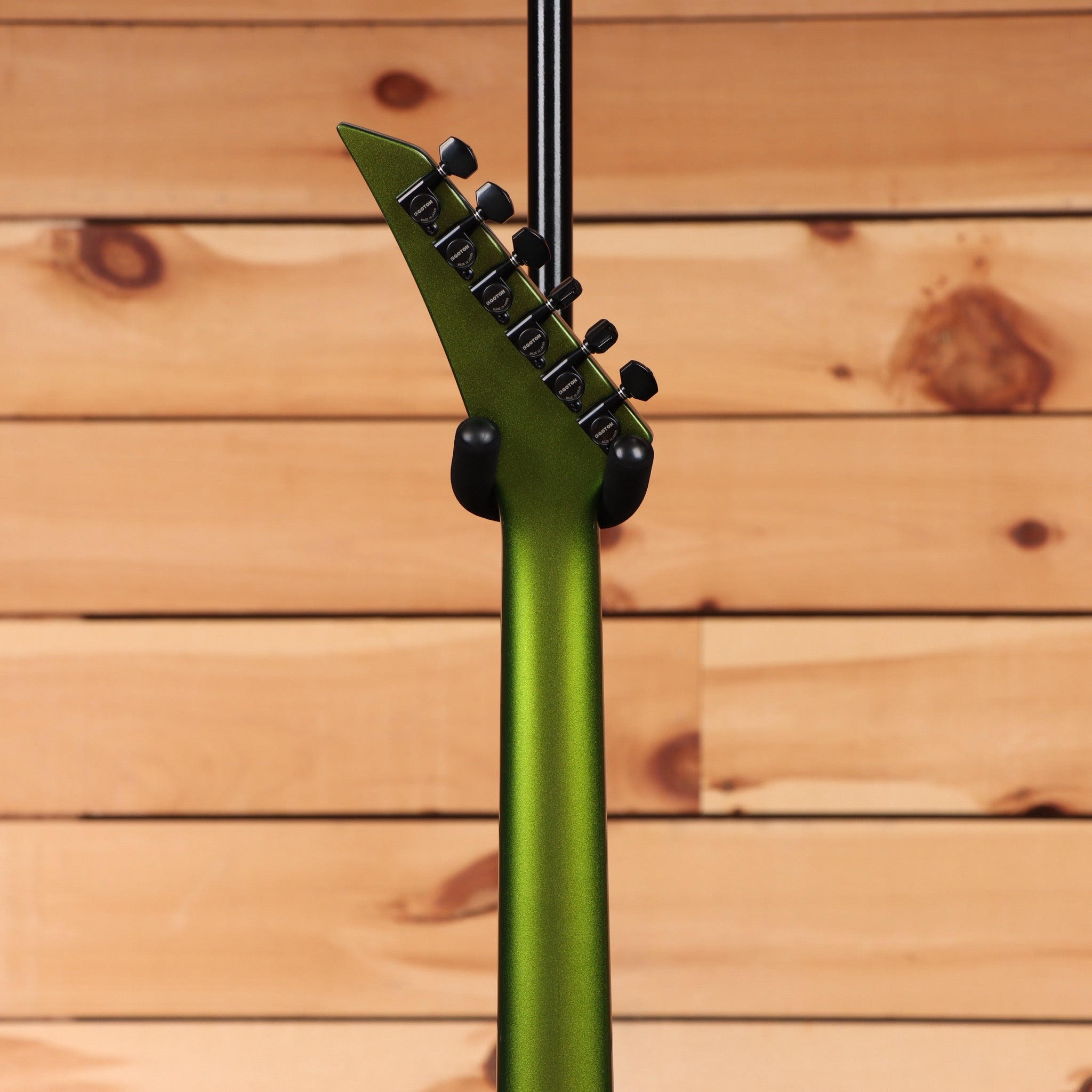 Jackson Righteous Run Custom Soloist electric guitar Green to Gold Shift with black hardware angled headstock