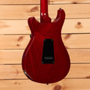 PRS S2 Standard 22 electric guitar Vintage Cherry showing mahogany back with black electronics cavity cover