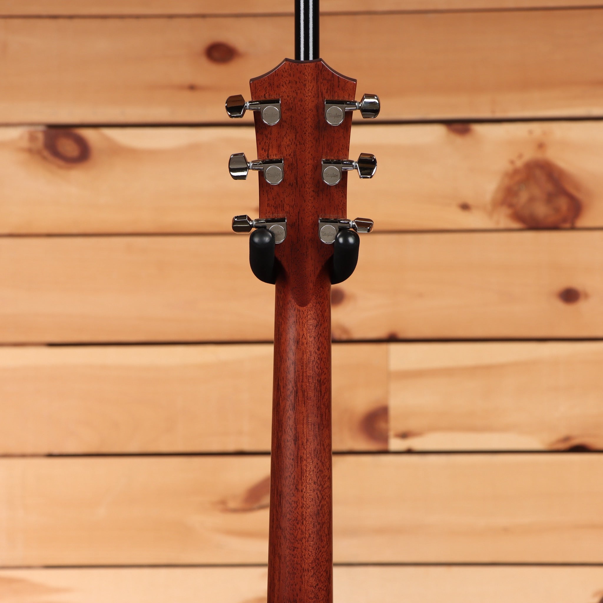 Taylor 414ce Next Generation acoustic-electric guitar Natural with mahogany neck and chrome tuners rear headstock view