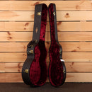 Taylor 314ce Next Generation hardshell guitar case open showing black exterior red velvet interior with gold latches