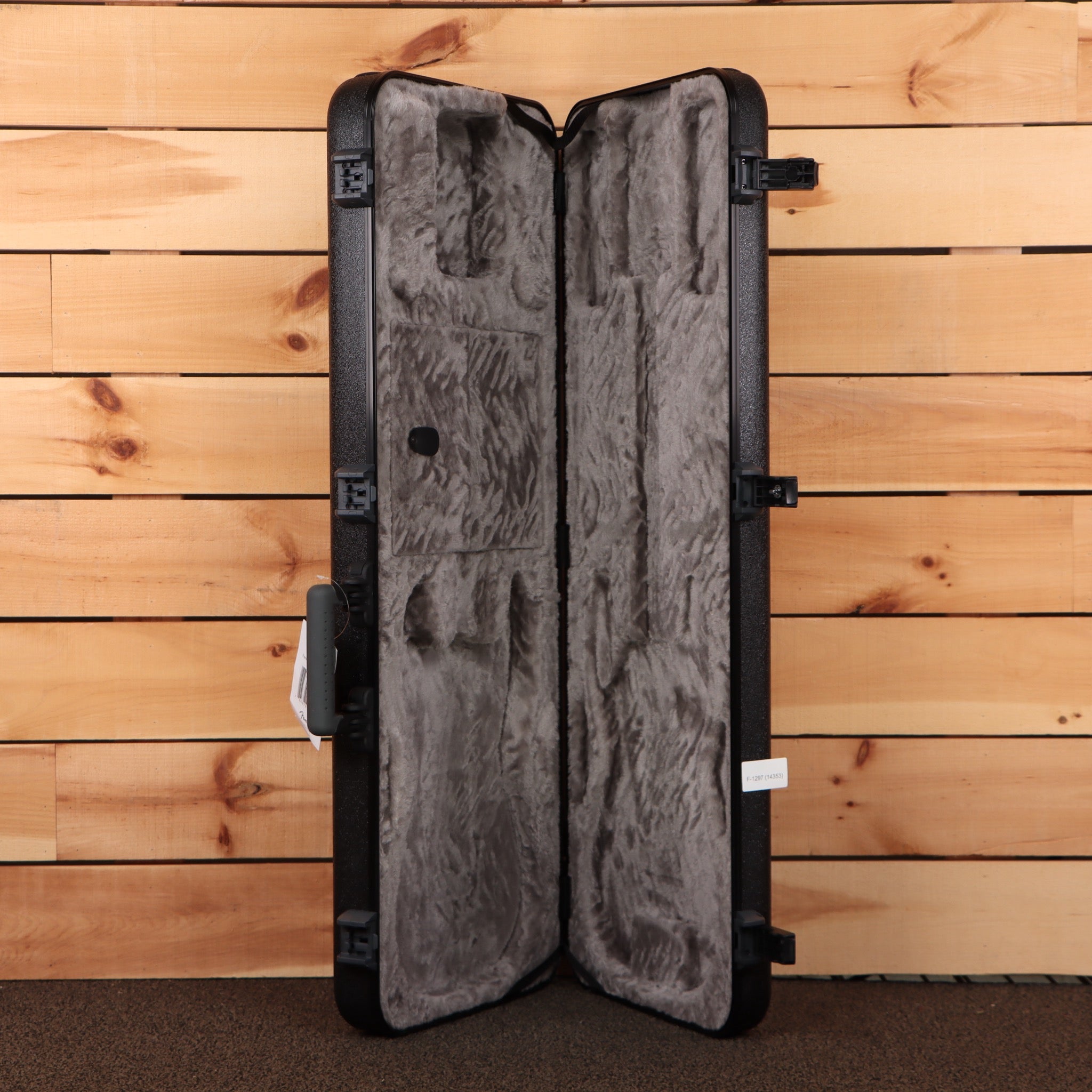 Fender American Ultra II Stratocaster HSS hard shell guitar case open showing gray plush interior foam padding