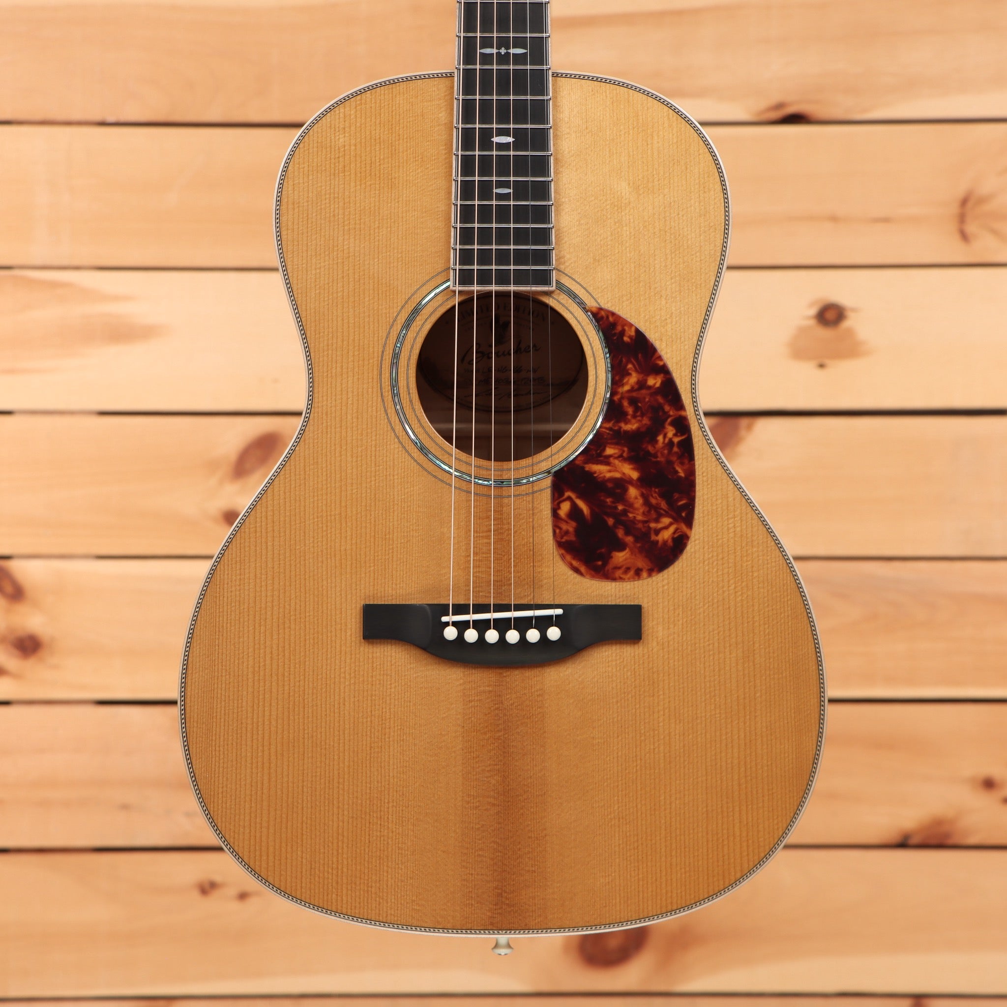 Boucher LE-HG-166-MV acoustic guitar natural finish with spruce top tortoise pickguard and ebony fretboard