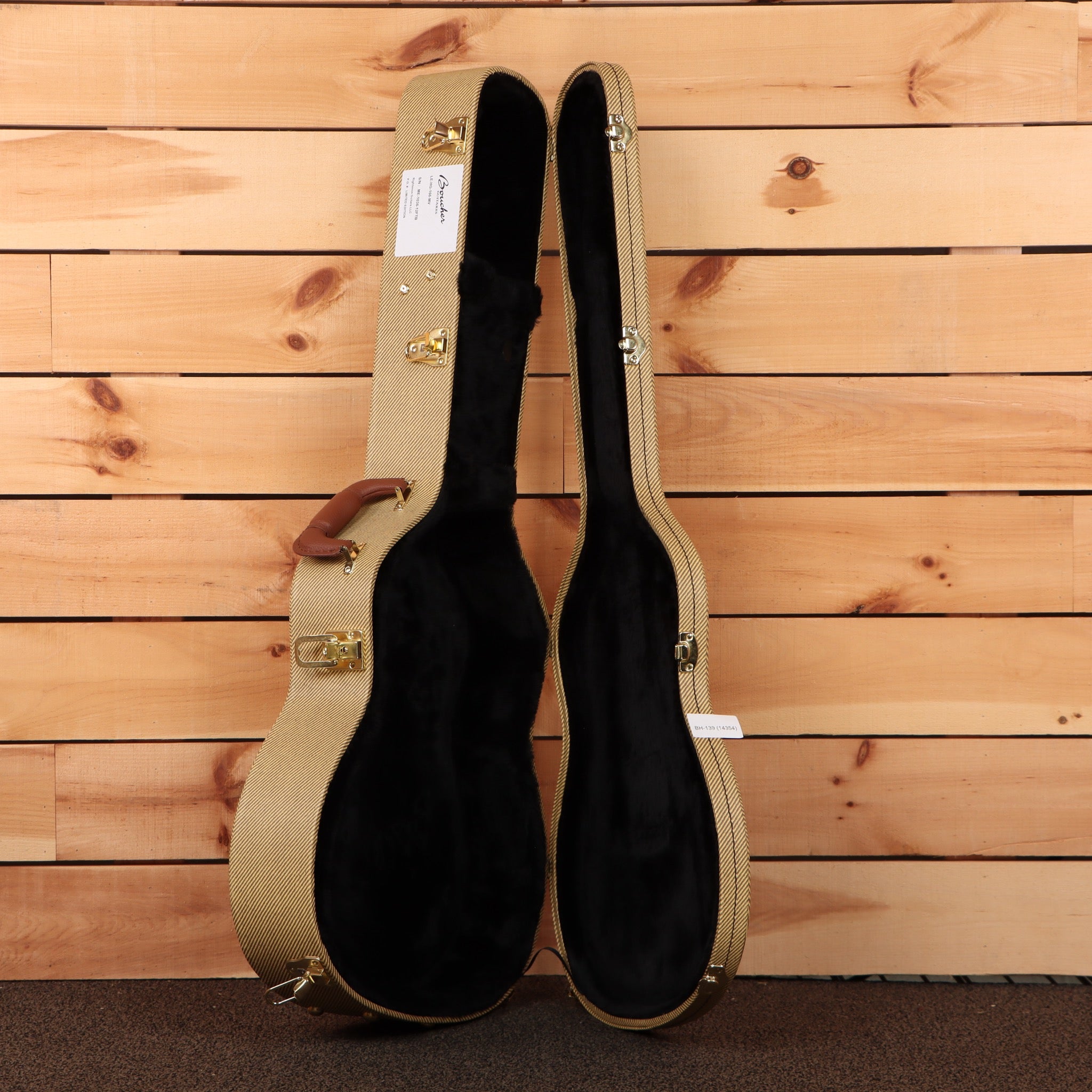 Boucher LE-HG-166-MV guitar hard case open tweed exterior black plush interior gold latches leather handle