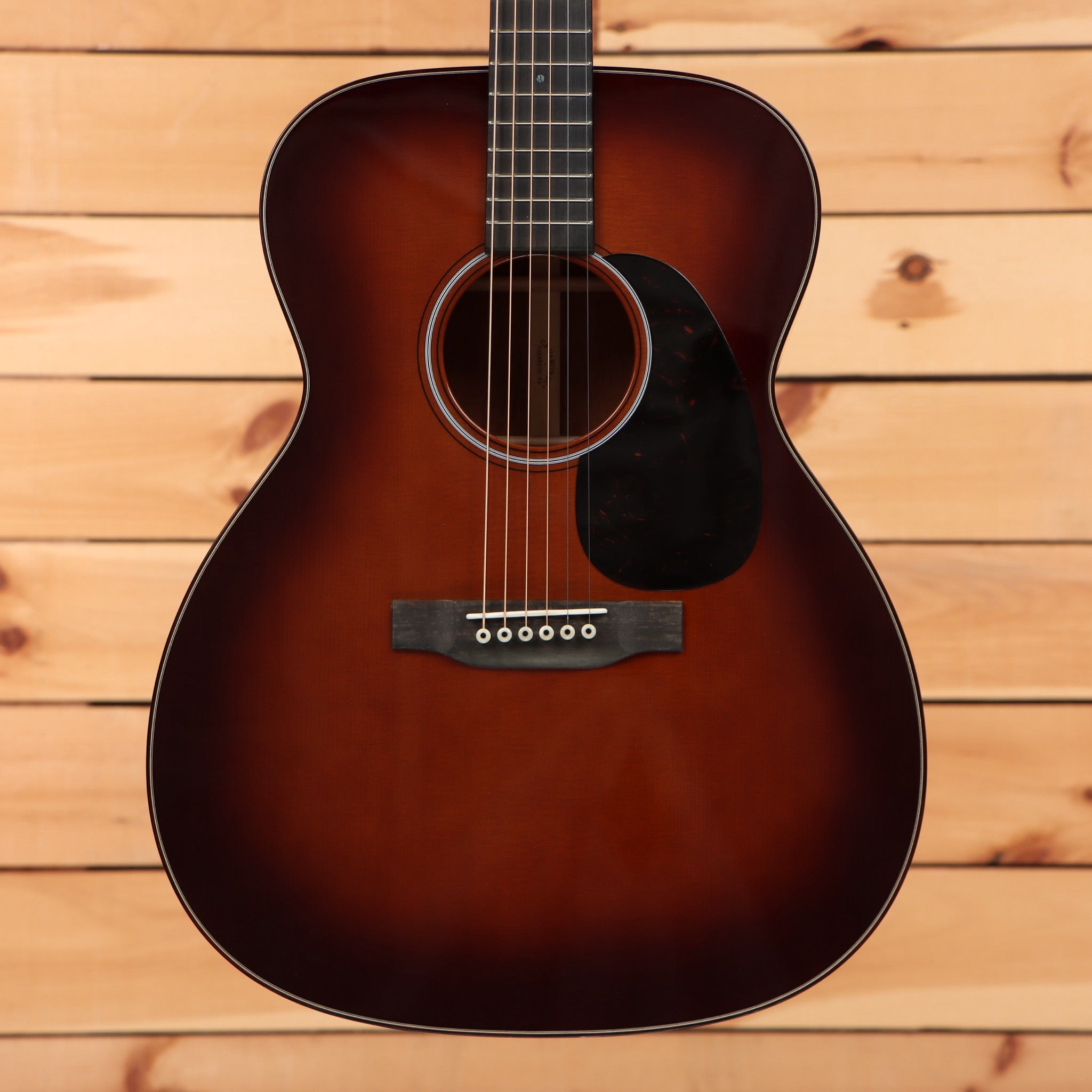 Martin Custom Shop NAMM 2026 Custom #7 1933 Ambertone acoustic guitar with sunburst top and tortoise pickguard