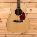 Bourgeois Touchstone OM LSH acoustic guitar Natural with spruce top, herringbone binding, and tortoiseshell pickguard