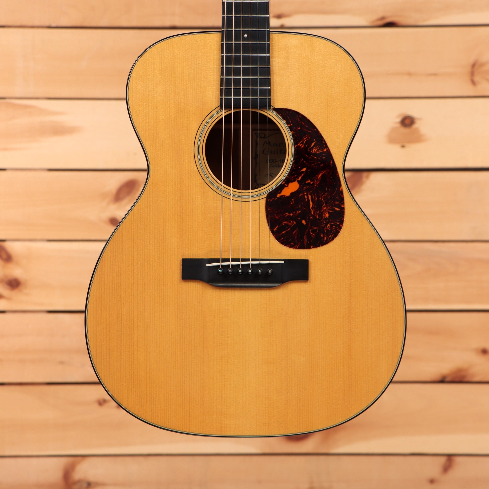 Martin 000-18 Golden Era acoustic guitar Natural with spruce top tortoise pickguard and ebony fretboard