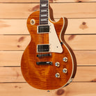 Gibson Les Paul Standard 60s Figured Top electric guitar Honey Amber with flamed maple top and dual humbuckers