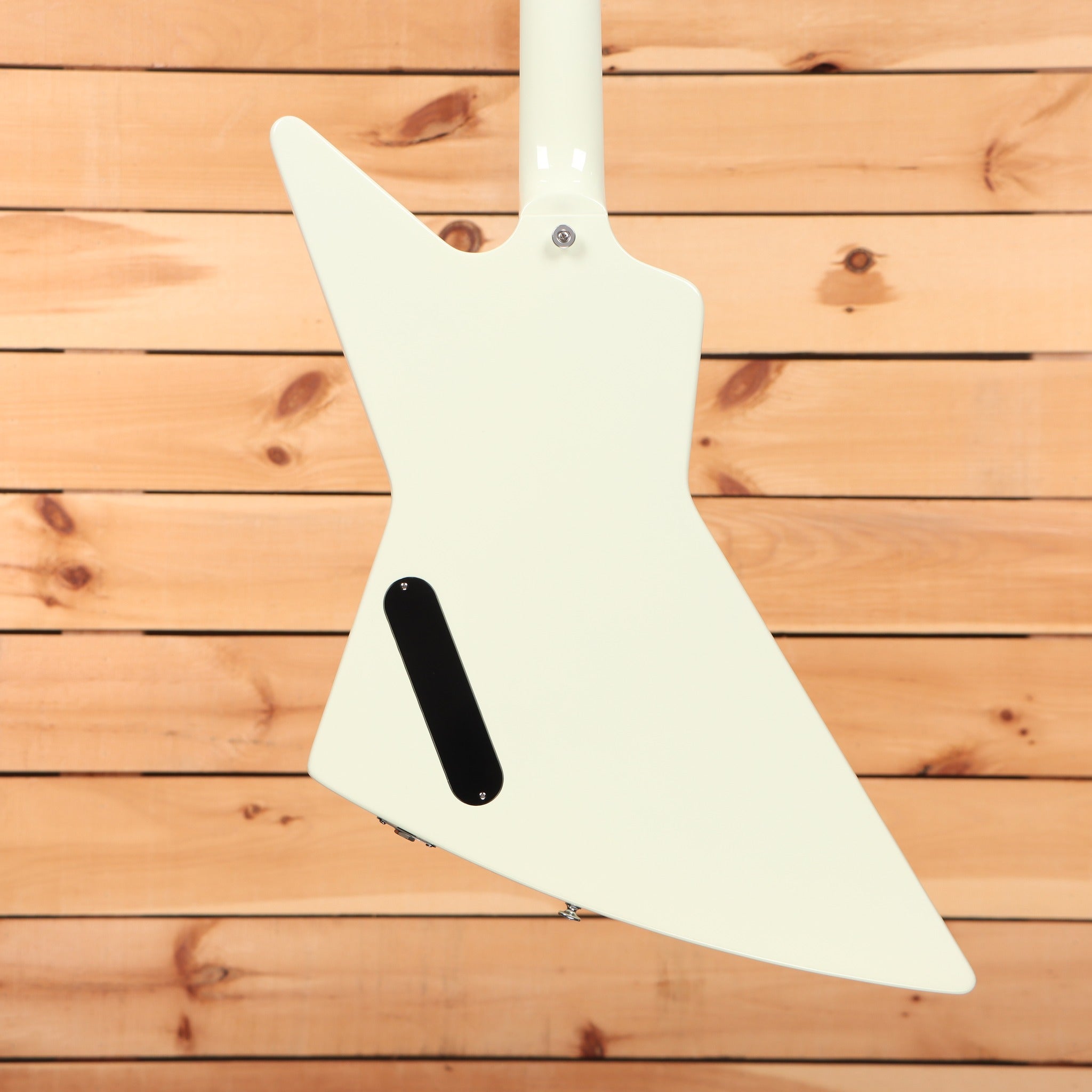 Gibson 70s Explorer electric guitar Classic White back view with electronics cavity cover and chrome hardware